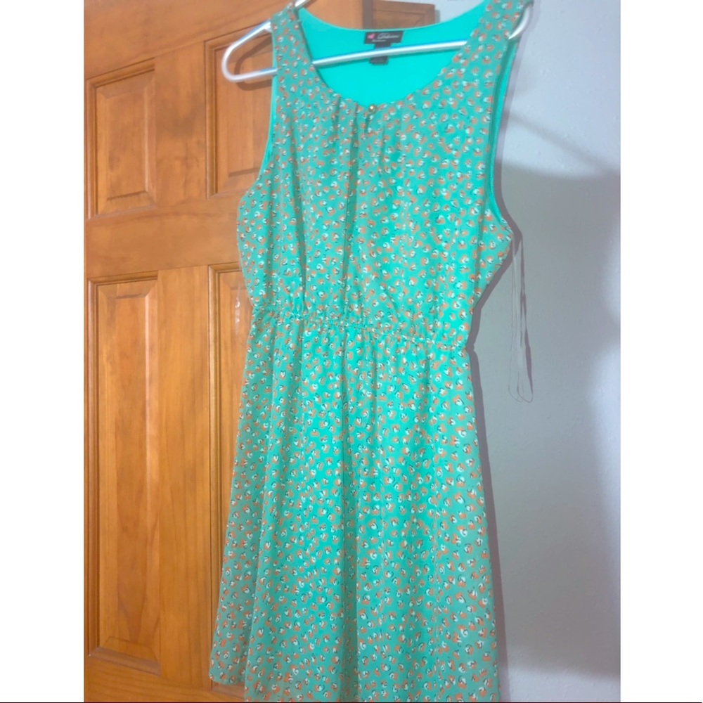 Teal dress with fun orange and black pattern